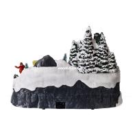 XOCOTŌ® Pueblo de navidad "Chefchaouen"  Escena navideña luminosa con niños jugando delante de la casa de Papá-Noel  37.5x21.5x25.5 cm - details 5