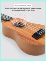 Ukelele De 35cm Para Niños Guitarra De Juguete Que Se Puede Usar Para Instrumentos Básicos Con Palillos Simulando Música De Guitarra - details 1