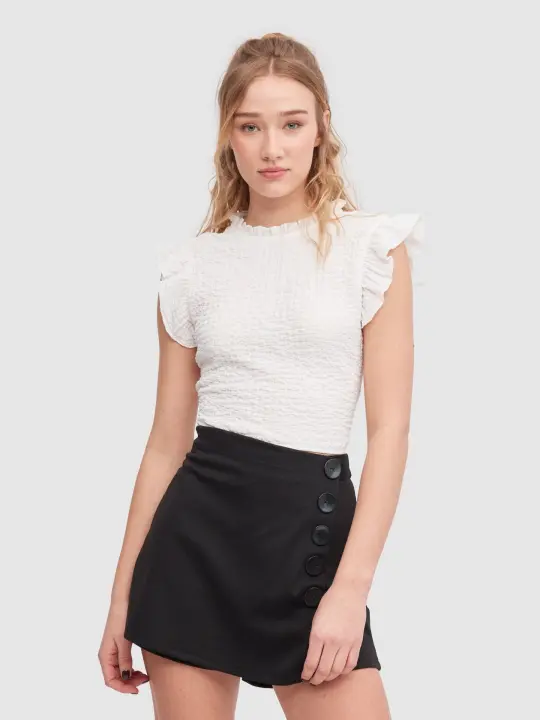 Falda pantalón negra con botones decorativos y cierre de cremallera trasera INSIDE - 1
