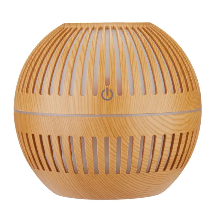 Hueco de estilo retro Redondo Creative mini humidifier USB para el hogar, Grano de Madera Claro Nueva y Creative máquina de aromaterapia de aceite esencial de Grano de Madera - 1
