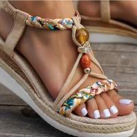 Perfect for the beach, these casual, bohemian-inspired women's wedge sandals feature hand-woven multicolor elastic and an open toe. - details 4