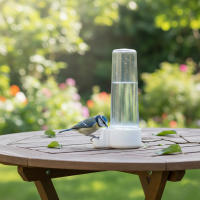 Bebedero Redondo para Pájaro. Pack 16 Unidades. 2 Colores: Transparente y Azul. Tamaño: 12x6x4 cm. Dispensadores Vacíos para Proporcionar Agua a Pájaros. Resistente a las Adversidades del Exterior. - details 0