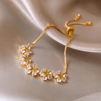 Pulsera De Moda Para Mujeres Con Diamantes Ajustable En Color Oro Con Encanto De Estrella Y Flor Joyería De Boda - details 9