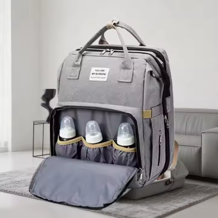 Cuna y portabiberón - Tejido Oxford impermeable, diseño plegable, aislamiento 360°, colchón de espuma incluido, dos ganchos para mochila, ideal para el bebé - 1