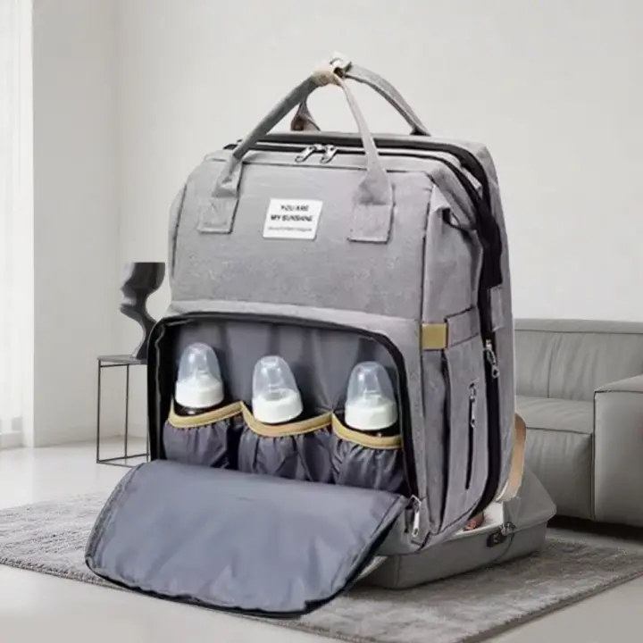 Cuna y portabiberón - Tejido Oxford impermeable, diseño plegable, aislamiento 360°, colchón de espuma incluido, dos ganchos para mochila, ideal para el bebé - 1