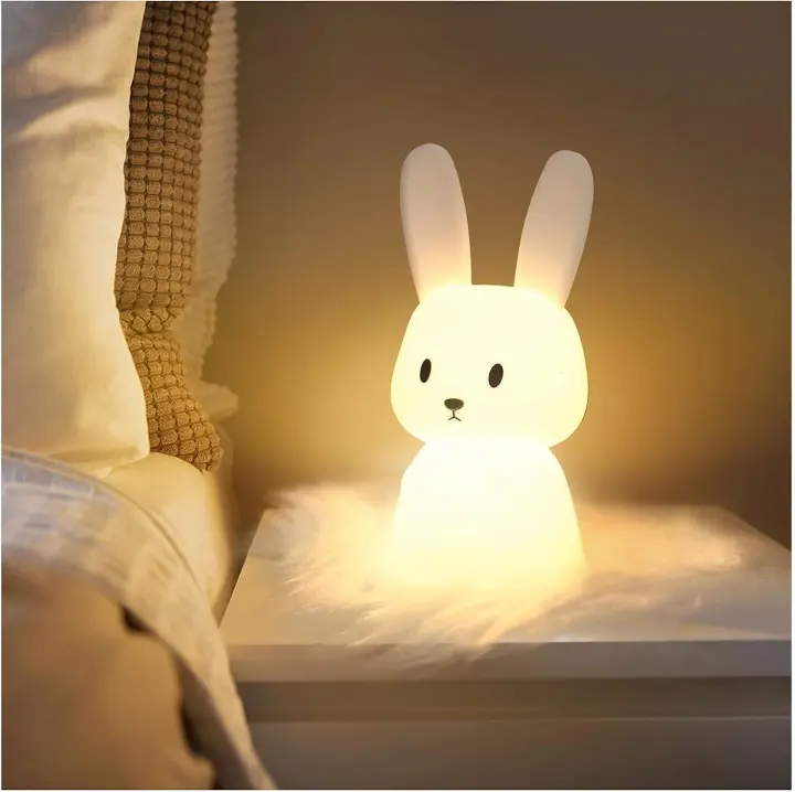 Luz de noche con forma de conejito para bebé con 7 cambios de luz | Control táctil | Carga USB | Función de temporizador | Lámpara de noche para dormitorio infantil, juguete de regalo, luz de noche de silicona para niños - 1