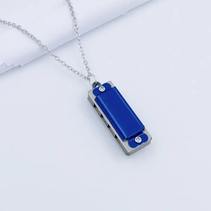 Nueva Armónica De 8 Tonos Con 4 Agujeros Mini Armónica De Metal Instrumento De Viento Cadena Juguete Musical Regalo - 1