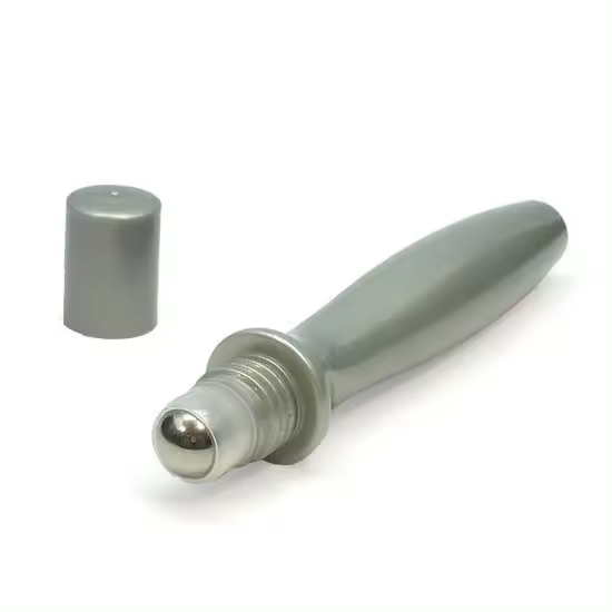 Mini roll|on  de plástico gris para tratamientos antiojeras. Envase vacío con bolita de acero inoxidable para reducir ojeras y bolsas. - 1