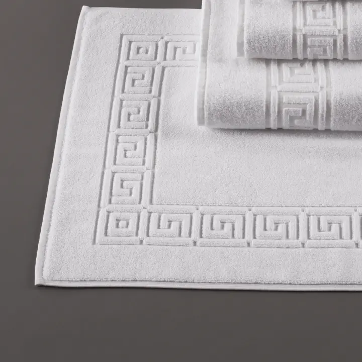 10 Alfombras de Baño Vanvino 650 gsm., 50x70 cm, 100% CO, color blanco, modelo Cybele (H02 1 003). Fabricación Portugal. Alta calidad textil: doble costura, bajo encogimiento y resistente al lavado industrial. - 1