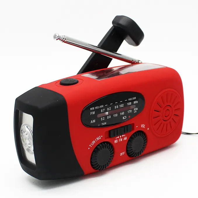 La radio de emergencia para exteriores completa es compatible con la banda meteorológica AM / FM / NOAA y tiene las funciones de carga de teléfonos móviles, generación de energía solar y manual, y una potente linterna LED - 1