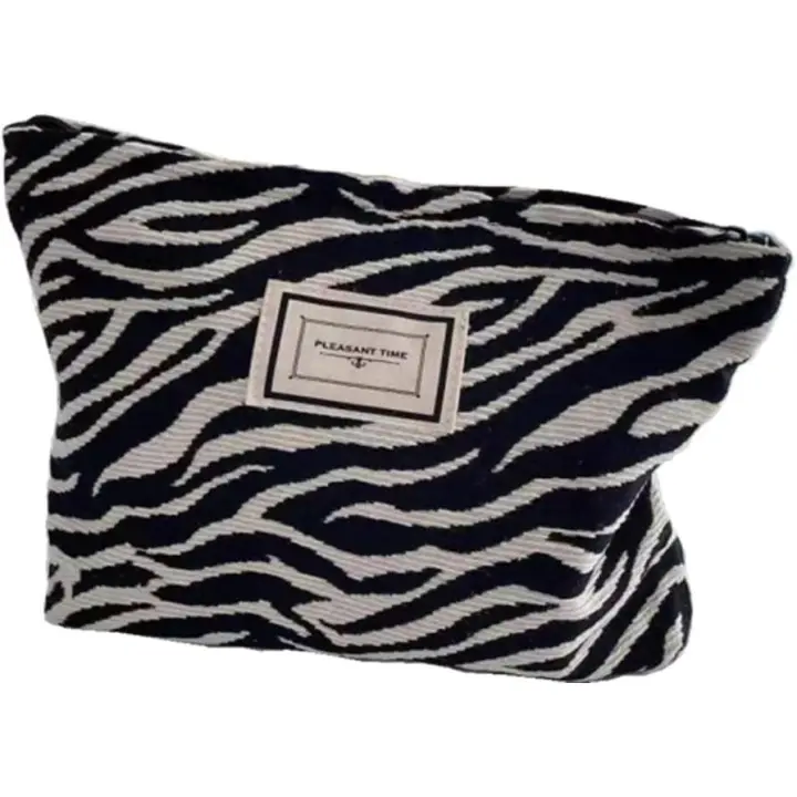 Bolsa de cosméticos de lona con estampado de cebra, bolsa de cosméticos de gran capacidad, adecuada para viajes y almacenamiento de mujeres - 1