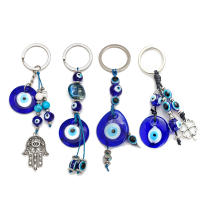 Llavero De Ojo De Suerte Con Mano De Fatima Y Mariposa Azul Para Coche Llavero Turco Con Ojo Maligno Para Hombres Y Mujeres Joyería EY138 - details 1