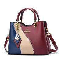 Bolsos de mujer premium, temperamento de moda, bolsos, colores contrastantes versátiles, bolsos de hombro casuales de gran capacidad Mochila de lujo de alta gama - details 3