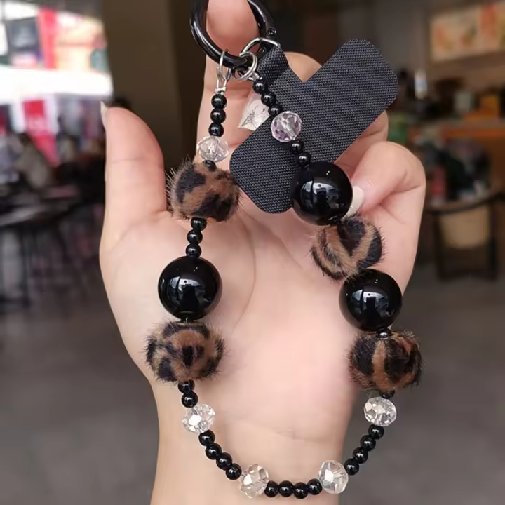 Cordón para teléfono móvil con estampado de leopardo, cadena colgante de felpa con cuentas antipérdida, joyería corta, colgante para teléfono para niñas y mujeres - 1