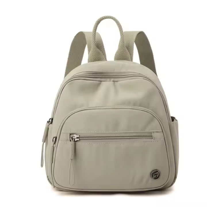 Mochila portátil de nailon para mujer, mochila informal ligera con múltiples bolsillos de Color sólido y asa impermeable - 1