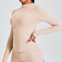 Top deportivo de manga larga, cuello redondo, ajustado, ligero y elástico para mujer - details 1