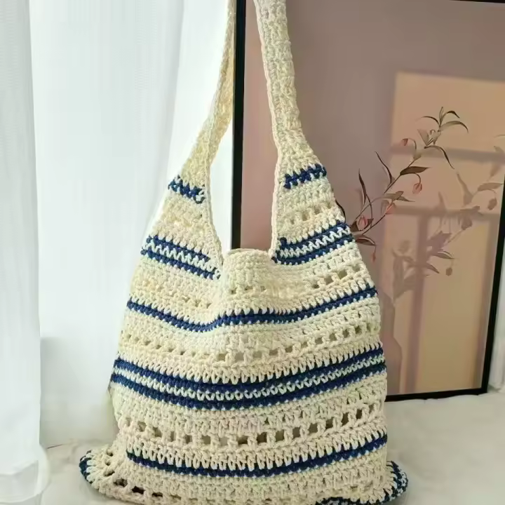 Bolso de algodón tejido de un solo hombro a rayas, bolso de paja hueco, bolso de vacaciones en la playa - 1