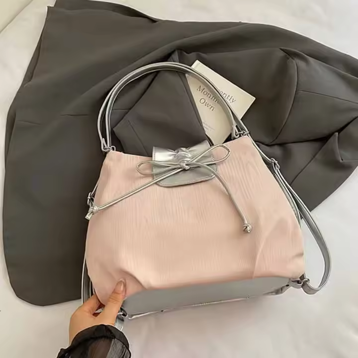 Mochila con lazo plateado de Color sólido, bolso de hombro estilo coreano de gran capacidad, bolso versátil para niñas - 1