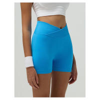 Pantalones bajos de yoga cintura cruzada elástica sin costuras para correr y andar en bicicleta - details 6