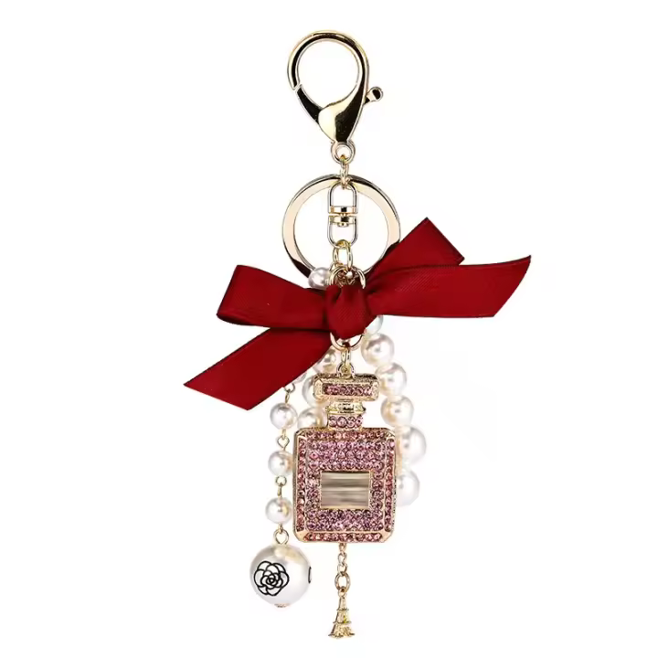 Llavero de Perfume de Perlas de Imitación Accesorio de Bolso para Mujeres Llavero Creativo con Lazo - 1