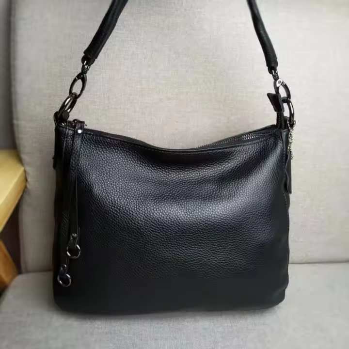 Bolso de cuero puro popular nuevo bolso de mujer de cuero versátil de moda bandolera de un solo hombro bolso bandolera portátil. - 1