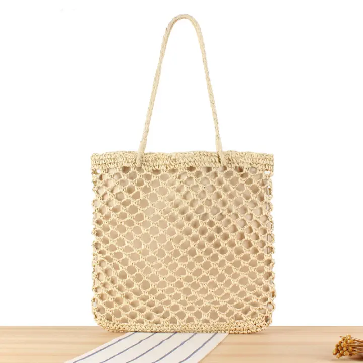 Bolsa tejida de hierba ahuecada hecha a mano, estilo Instagram, turismo de playa y vacaciones, cuerda de papel, un solo hombro - 1