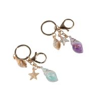 Lindo llavero de concha luminosa estilo bohemio que brilla en la oscuridad colgantes de playa de mar personalidad creativa llavero de concha de estrella de mar - details 3