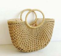 Producto al por mayor, bolso de mano de playa con hombro de señora de verano medio redondo de Color sólido Simple ahuecado, bolso de mano de paja tejido - details 1