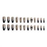 Uñas Falsas con Lazo Negro y Patrones de Estrellas Ideal para Principiantes en Arte de Uñas - details 2