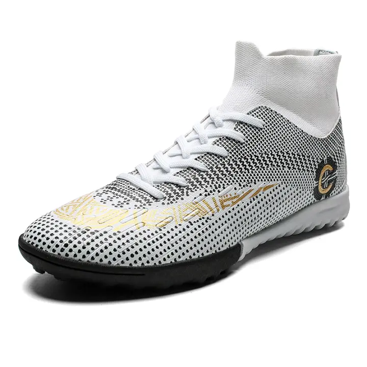 Botas de entrenamiento de fútbol para terreno firme para adultos, botines de fútbol profesionales para hombres de la Copa Mundial - 1