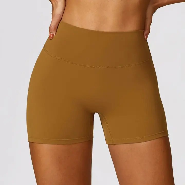 Pantalones cortos de Yoga de cintura alta afilados para mujer, pantalones cortos deportivos ajustados de secado rápido con realce de melocotón para correr y Fitness - 1