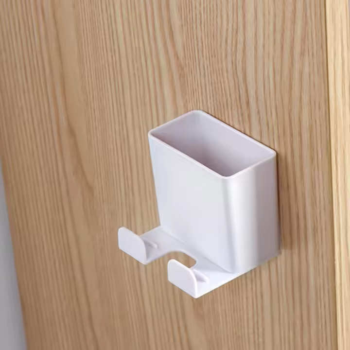 Caja de almacenamiento montada en la pared, organizador de Control remoto, soporte para enchufe de teléfono móvil, contenedor de carga colgante - 1