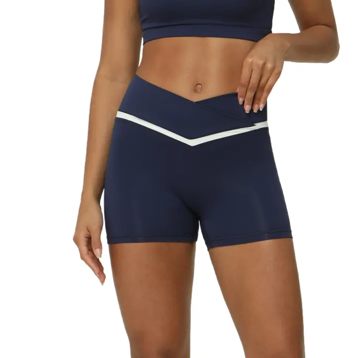 Pantalones cortos de yoga en forma de V con parte inferior deportiva de entrenamiento con cintura cruzada y contraste de color Fiess para mujer - 1