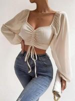 Camiseta Sexy de malla con mangas acampanadas y cordón para mujer, camiseta con ombligo descubierto en el pecho, parte inferior de manga larga - details 1