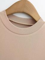 Vestido básico de manga corta de color sólido ajustado de estilo europeo y americano para mujer con cintura y cuello medio alto delgado Empalme de una palabra falda de swing grande - details 8