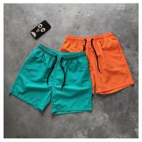 Stock Pantalones cortos de playa Pantalones cortos para correr de poliéster Pantalones cortos de traje de baño bordados para hombres Tejido casual ligero - details 6