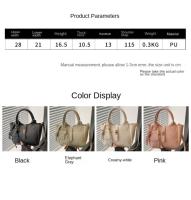 Bolso de mano elegante con forma de cubo cruzado inclinado, bolso de mano con colgante de cachorro para mujer, bolso de hombro de cuero de PU de alta gama con patrón de lichi, primavera y verano - details 1
