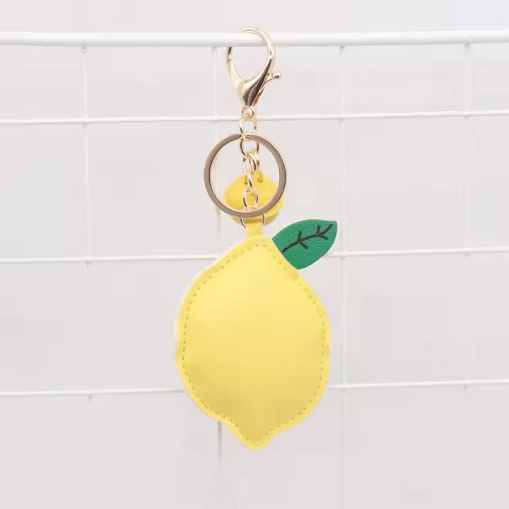 Precioso llavero de cuero PU con forma de limón, colgador de cuero PU con dibujos de frutas, llavero de coche, colgante de bolso de moda para mujer - 1