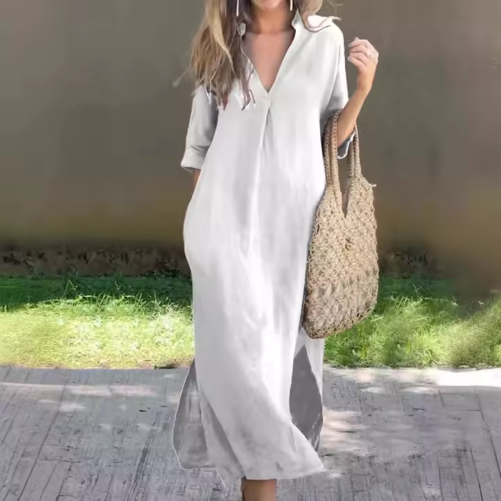 Vestido de mujer con cuello en V, de moda. - 1