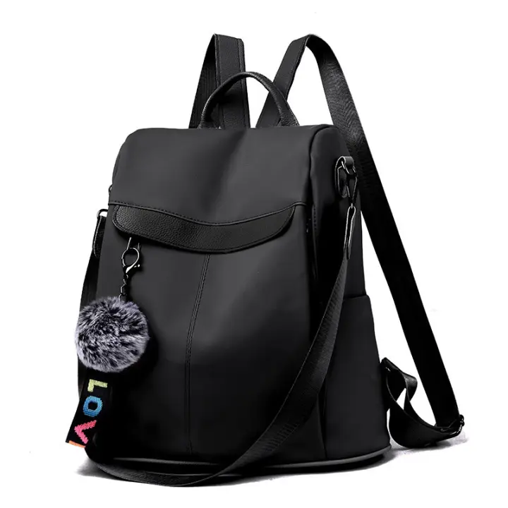Mochila impermeable para mujer, estilo moderno Oxford, con borlas y pelo, gran capacidad para viajes y escuela. - 1