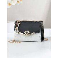 Bolso de hombro para niña pequeña a la moda, colgante de borla cuadrada inclinada, decoración de lentejuelas, mochila de lujo de alta gama - details 0