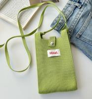 El nuevo bolso de teléfono móvil de punto de un hombro de color sólido de primavera está de moda con un bolso de dopamina para hombres y mujeres. - details 2