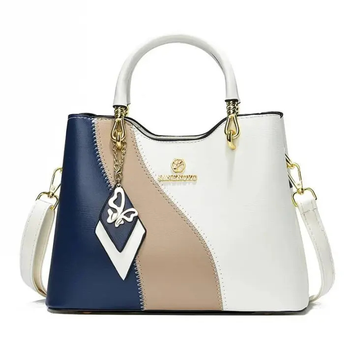 Bolsos de mujer premium, temperamento de moda, bolsos, colores contrastantes versátiles, bolsos de hombro casuales de gran capacidad Mochila de lujo de alta gama - 1