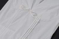 Minivestido estampado con cuello en V y mangas abullonadas. Vestido adornado con lazo de cintura alta con estampado floral. - details 21