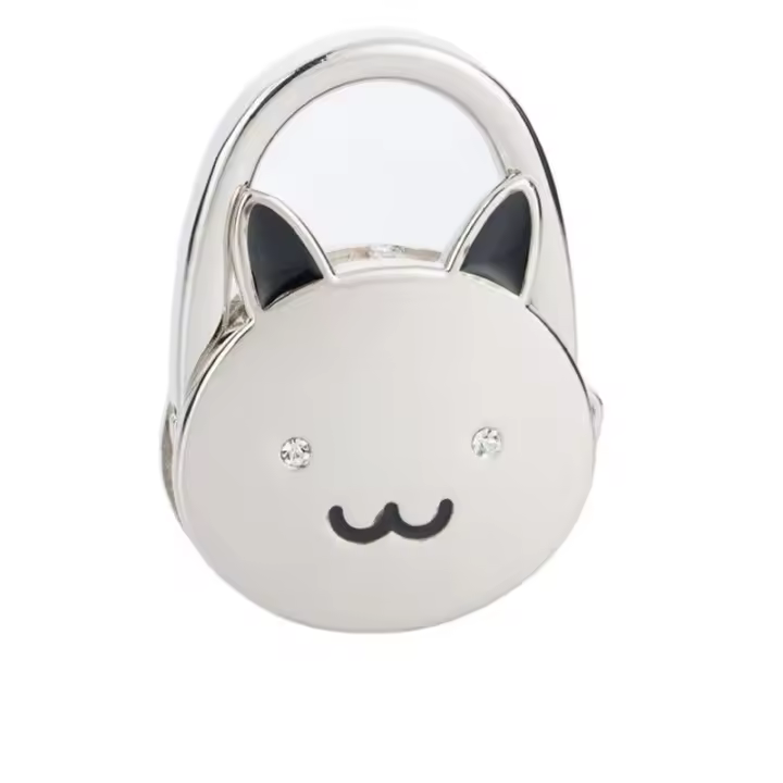 Gancho de Bolso Portátil con Diseño de Conejo de Dibujos Animados 1Pcs Base de Goma Antideslizante Metal Plegable para Organización de Almacenamiento - 1
