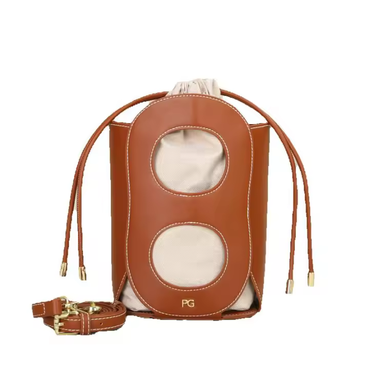 PG-Bolso cruzado de diseñador de nueva marca, diseño hueco de ambiente Simple, bolso de hombro a la moda, mochila de lujo de alta gama para mujer 2025 - 1