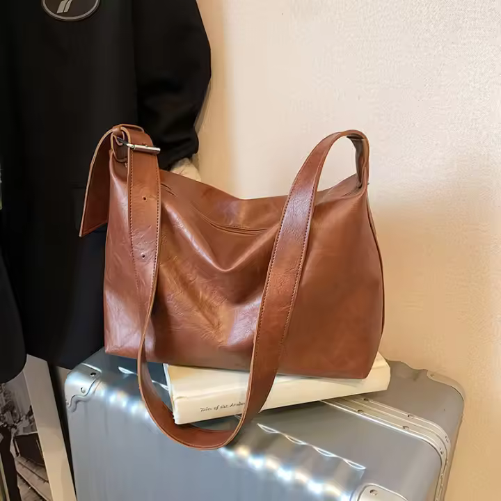 2025 primavera nuevo estilo hermoso bolso de mano hombro axila bolso de moda de gran capacidad personalidad bolso femenino - 1