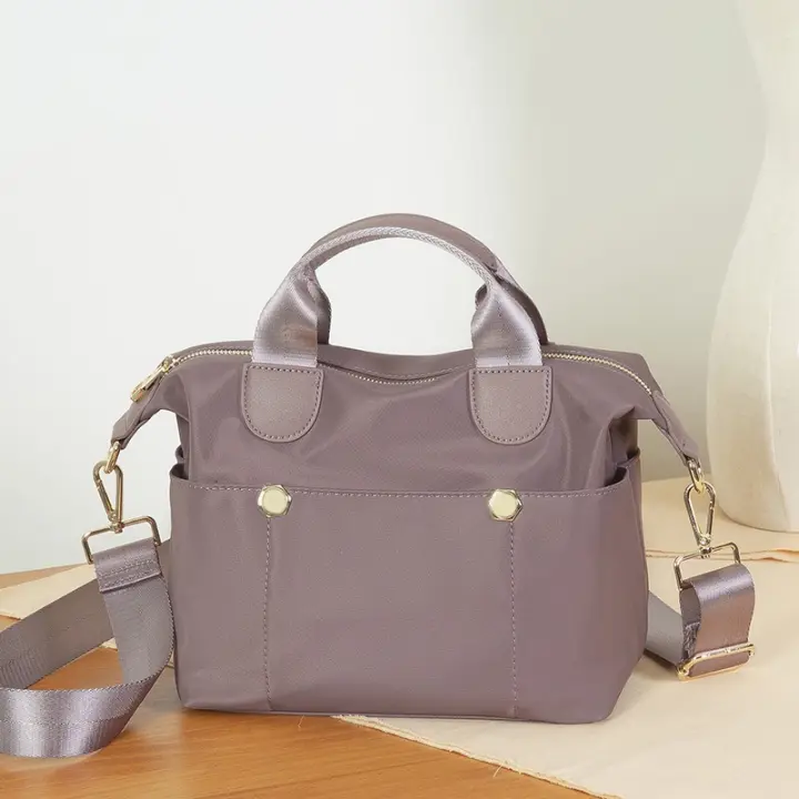 2025 nuevo bolso de hombro inclinado bolso de hombro de viajero de moda bolso de ocio de tela Oxford Simple - 1
