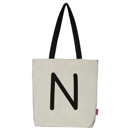 Bolso tote con cremallera, forro y bolsillo interior. Exterior: Algodón 100%. Incluye sobre de regalo de papel kraft. Modelo N. Color: Crudo / Negro. Medidas: 37x38 cm. - 1