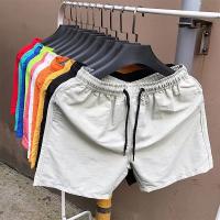 Stock Pantalones cortos de playa Pantalones cortos para correr de poliéster Pantalones cortos de traje de baño bordados para hombres Tejido casual ligero - details 0